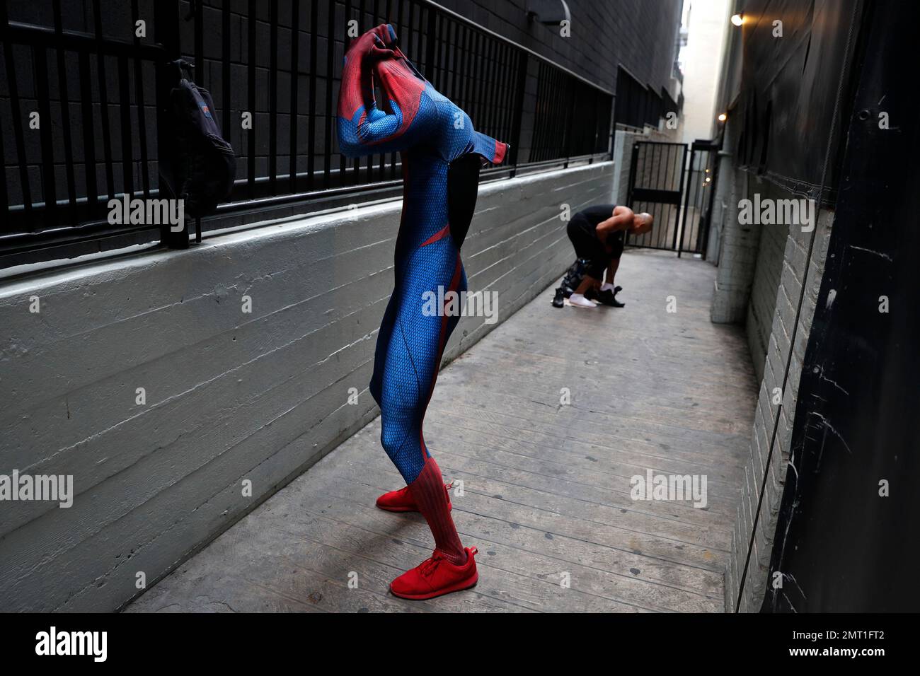 In this Thursday, May 25, 2017 photo, two Spider-Man impersonators ...