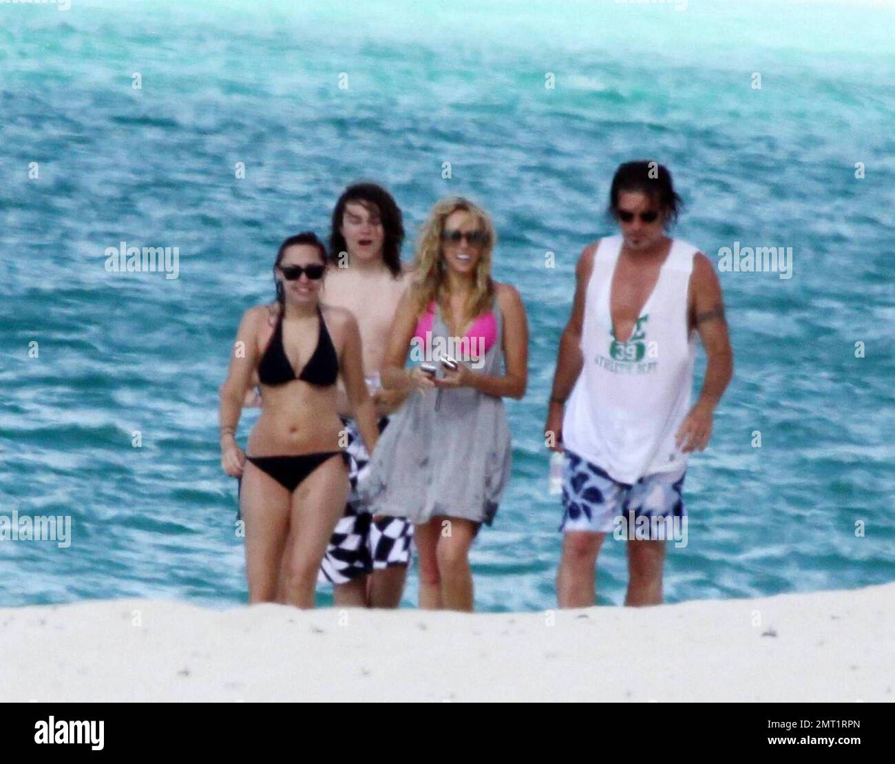 Exclusive!! Miley Cyrus enjoys a day at the beach jetskking with her whole  family on her mother Leticia 'Tish' Cyrus' birthday. The Cyrus family are  enjoying time on an Island in the