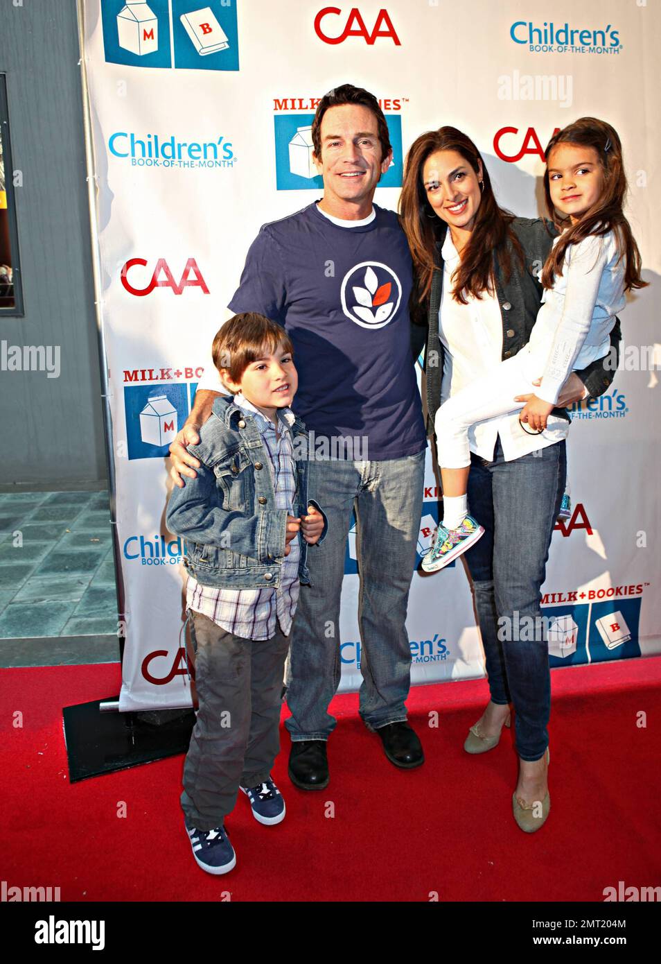 Jeff Probst and girlfriend actress Lisa Ann Russell and her kids Michael Gosselaar and Ava Gosselaar (born with ex-husband 'Saved by the Bell' actor Mark-Paul Gosselaar) attend the 2nd Annual Milk and Bookies Story Time Celebration held at the Skirball Cultural Center. Los Angeles, CA. 03/20/11. Stock Photo