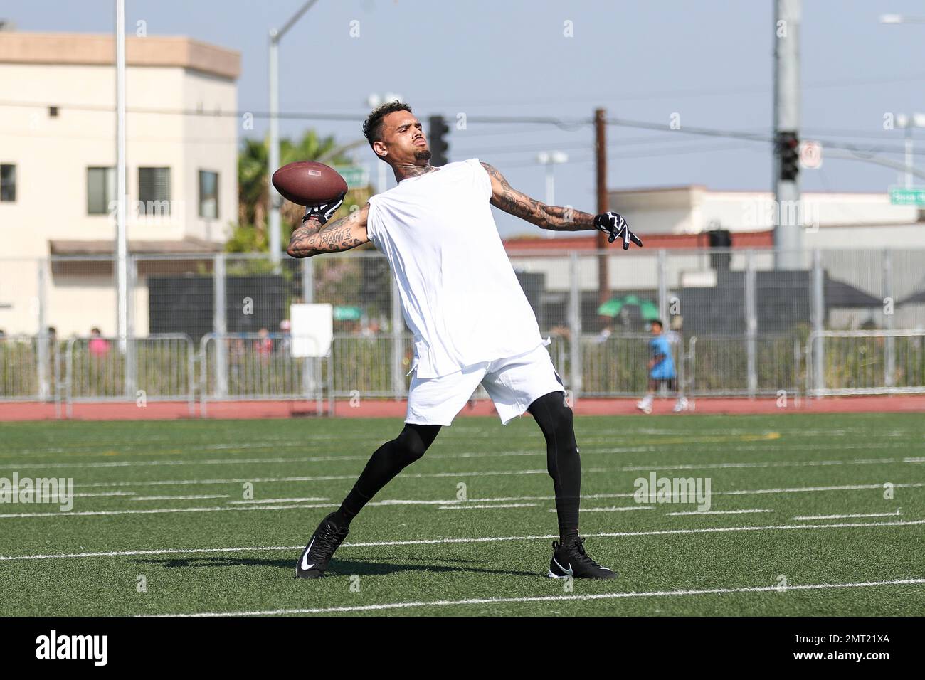 Chris Brown attends the 4th Annual Athletes vs Cancer Celebrity Flag  Football Game held at John Burroughs High School on Sunday, Aug. 6, 2017,  in Burbank, Calif. (Photo by John Salangsang/Invision/AP Stock, image size:1300x956