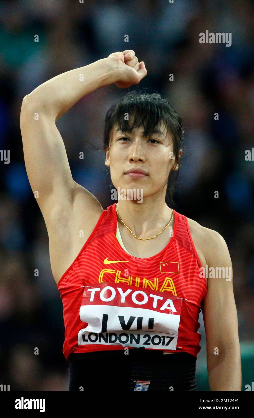 China's Lyu Huihui gestures before competing in the women's javelin