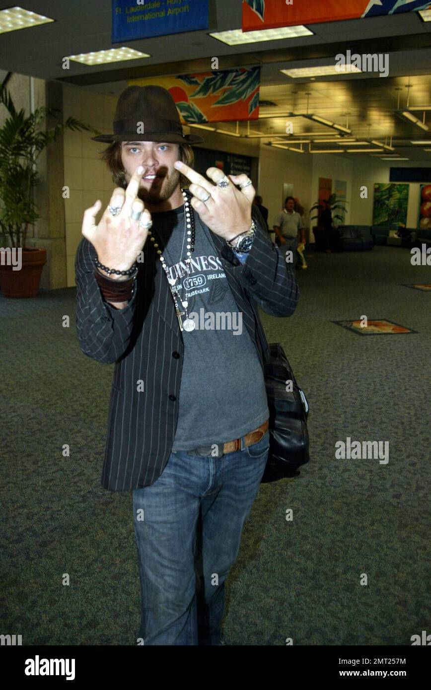 Exclusive!! Mira Sorvino's husband Chris Backus lets his fingers do the