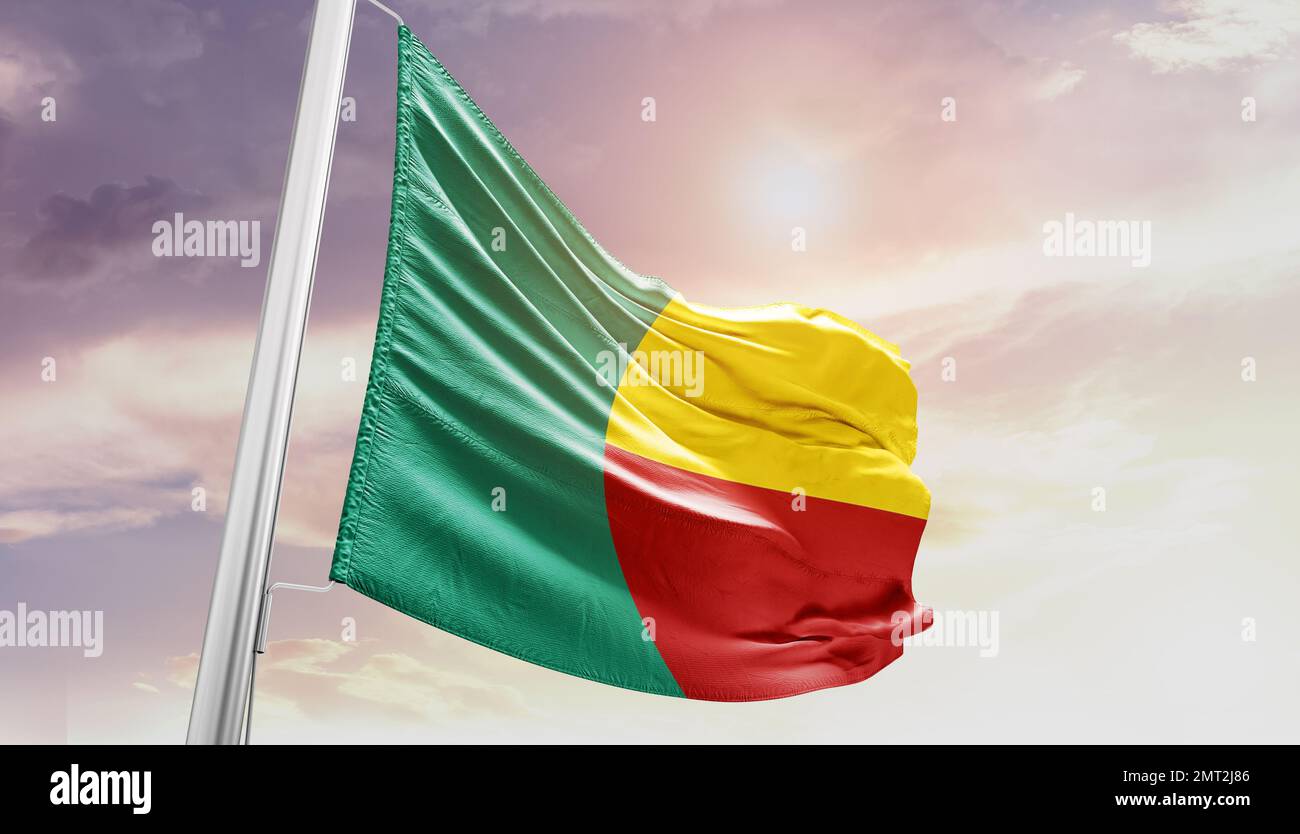 Benin waving flag in beautiful sky. Stock Photo