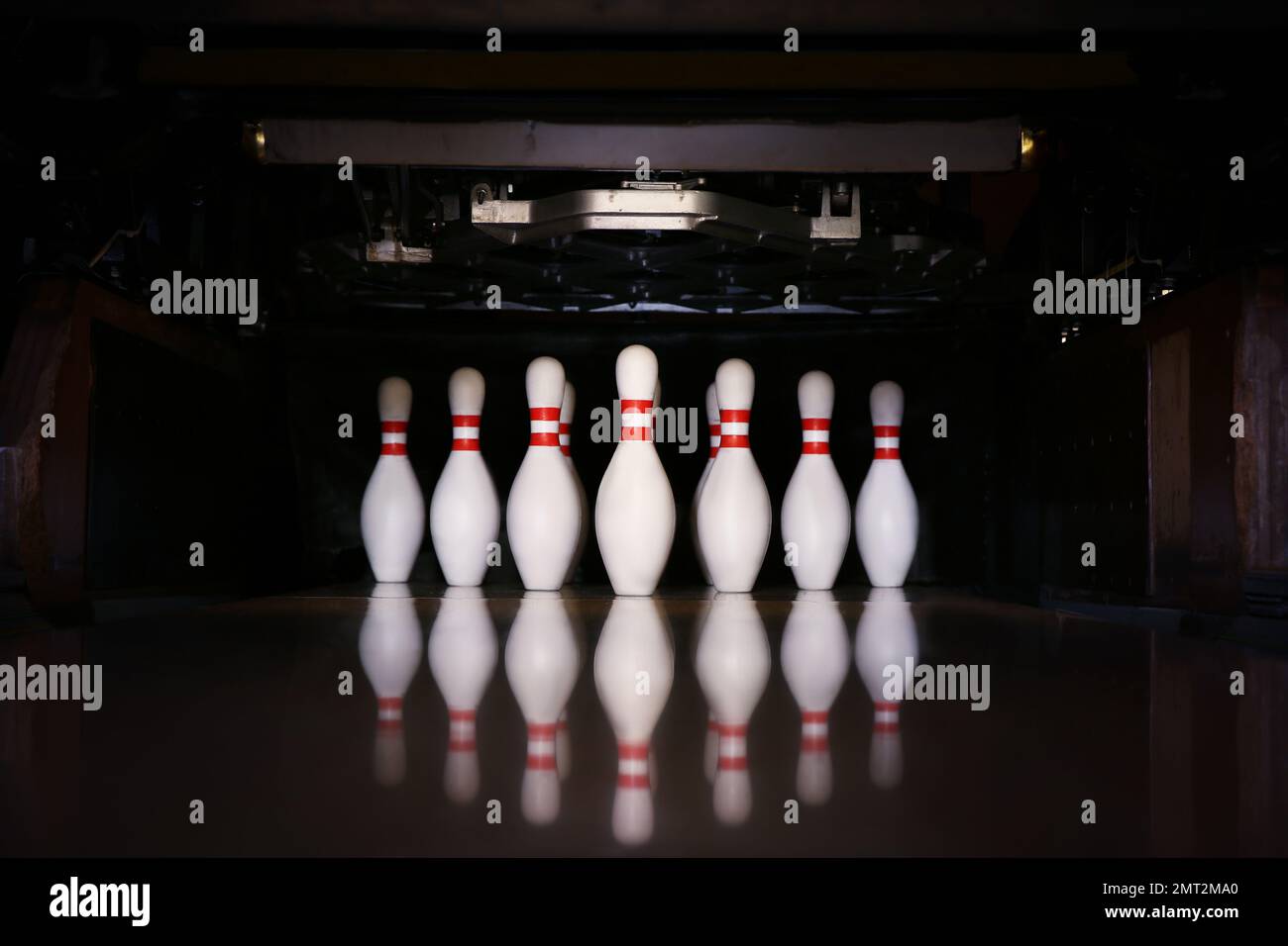 Bowling alley lane with set pins in club Stock Photo Alamy