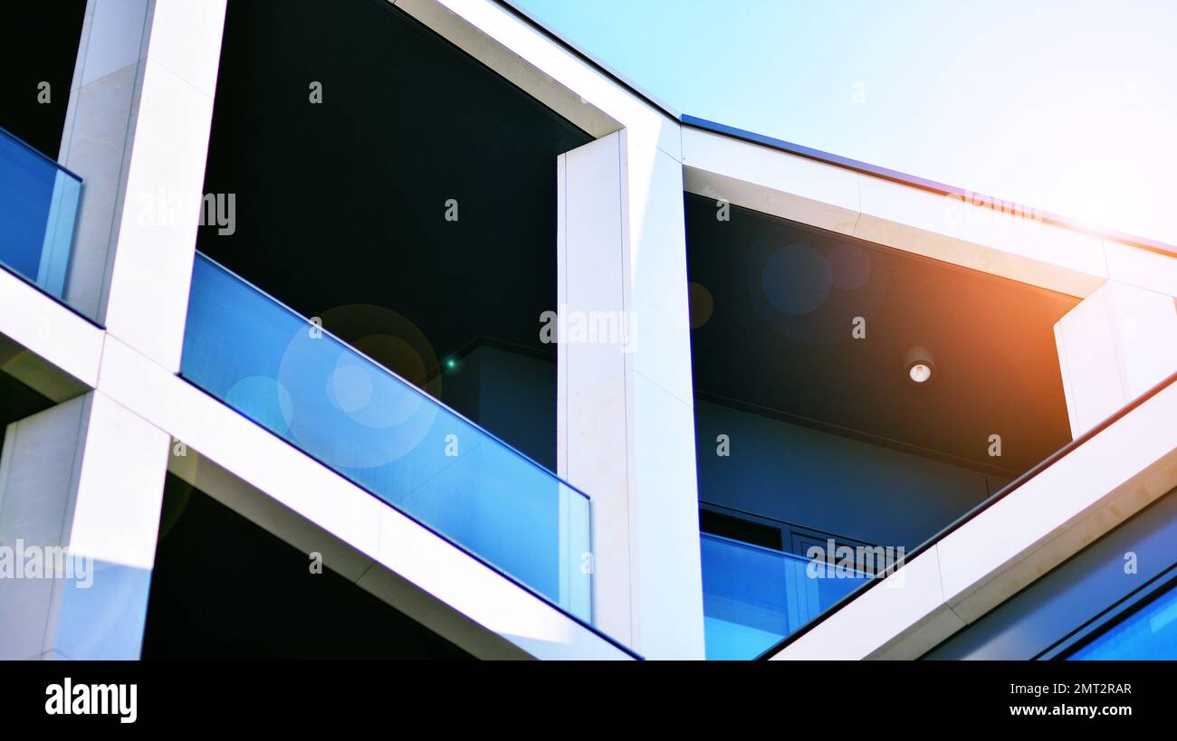 Abstract closeup of the glass-clad facade of a modern building covered ...