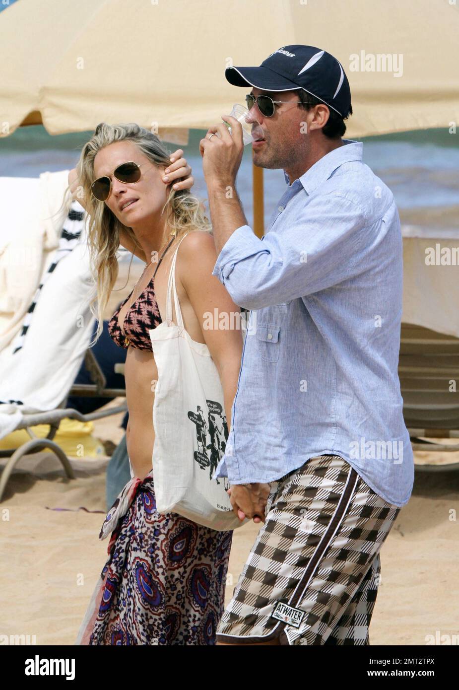 Newlyweds Molly Sims, 38, and Scott Stuber, 42, stroll handinhand on