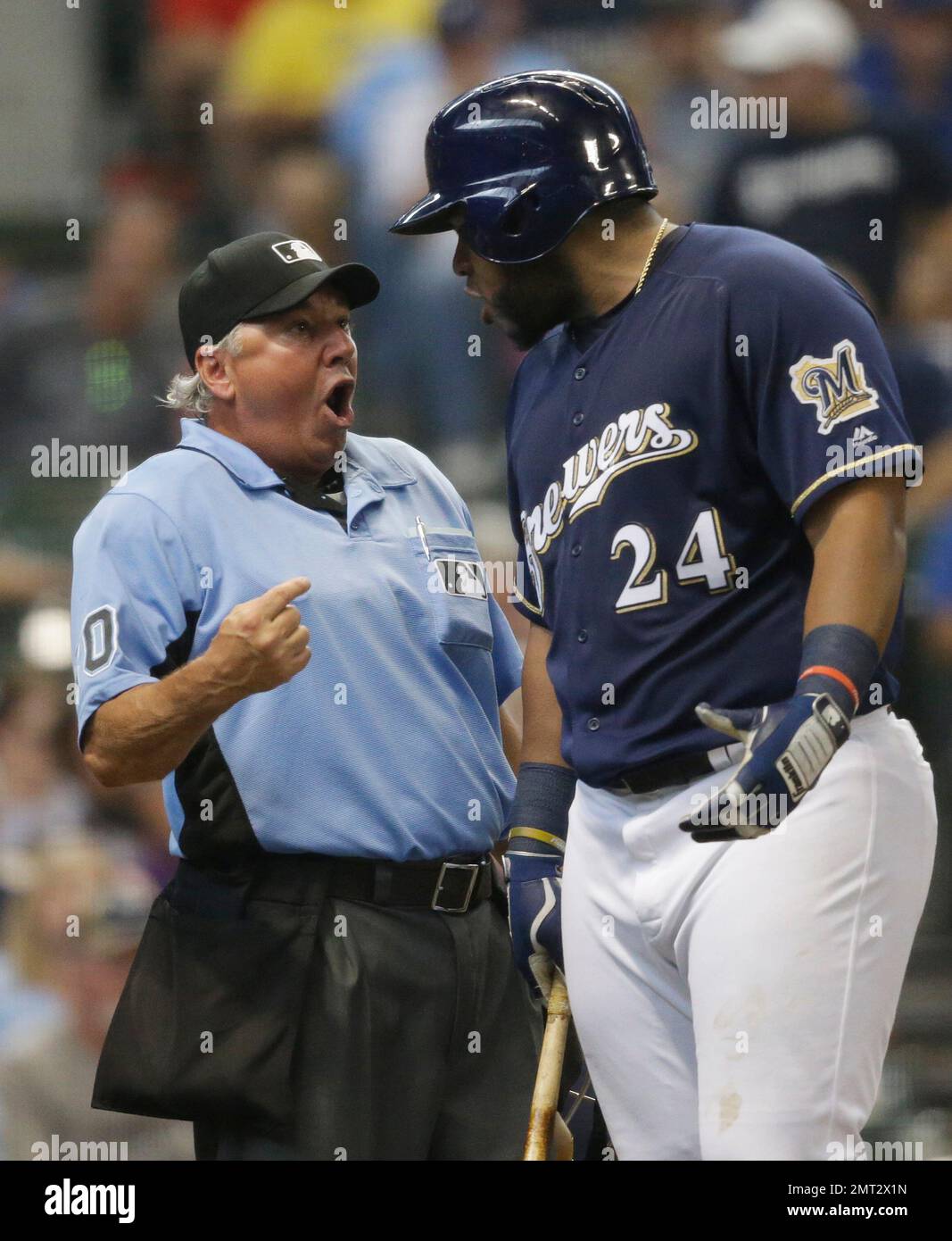 Milwaukee Brewers' Jesús Aguilar, right, gestures after hitting a double  during the seventh inning of a baseball game against the New York Mets,  Sunday, May 5, 2019, in Milwaukee. (AP Photo/Aaron Gash