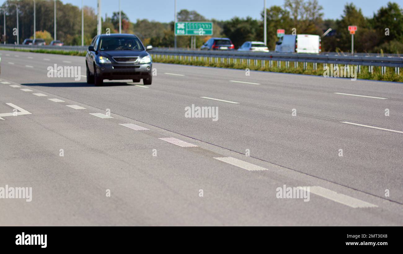 View on a concrete highway. Modern highway safety markings on concrete. Stock Photo