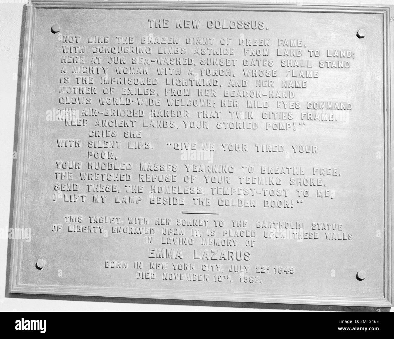 FILE In this circa 1950 photo shows a bronze plaque of the poem by Poet Emma Lazurus on Statue