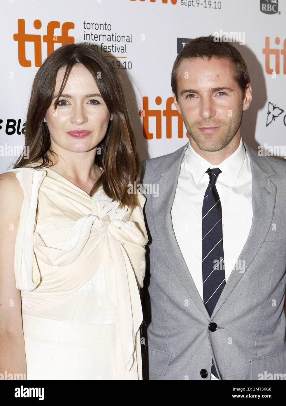 Actor Alessandro Nivola and wife, actress Emily Mortimer, arrive at the red carpet premiere of "Janie Jones" held at Roy Thomson Hall during the 35th Toronto International Film Festival. Toronto, ON. 09/17/10. Stock Photo