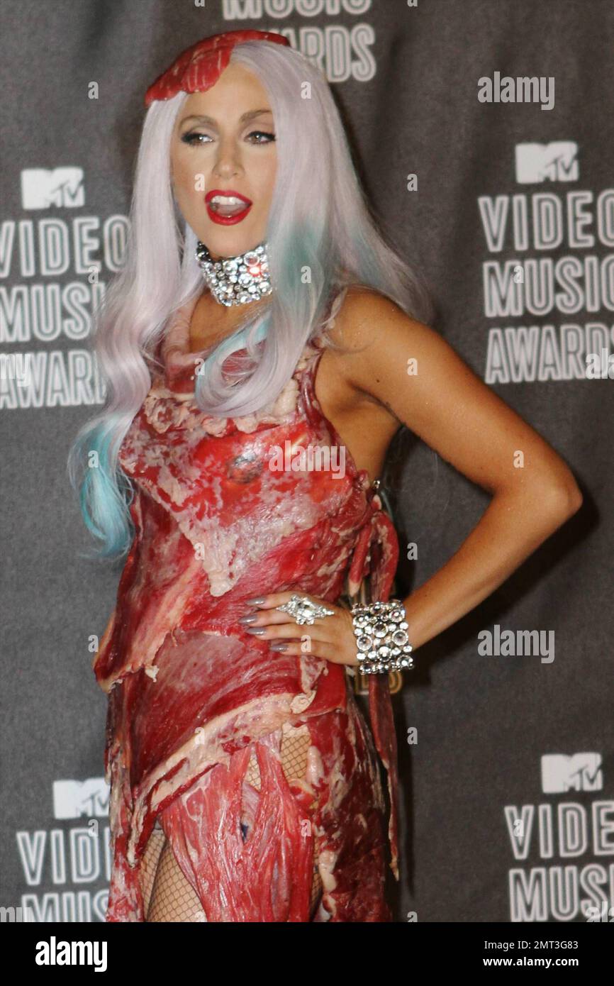 Lady Gaga adorned in her meat dress, boots and hat, backstage in the  pressroom after the 2010 MTV Video Music Awards held at the Nokia Theatre.  Top prizes went to pop singer