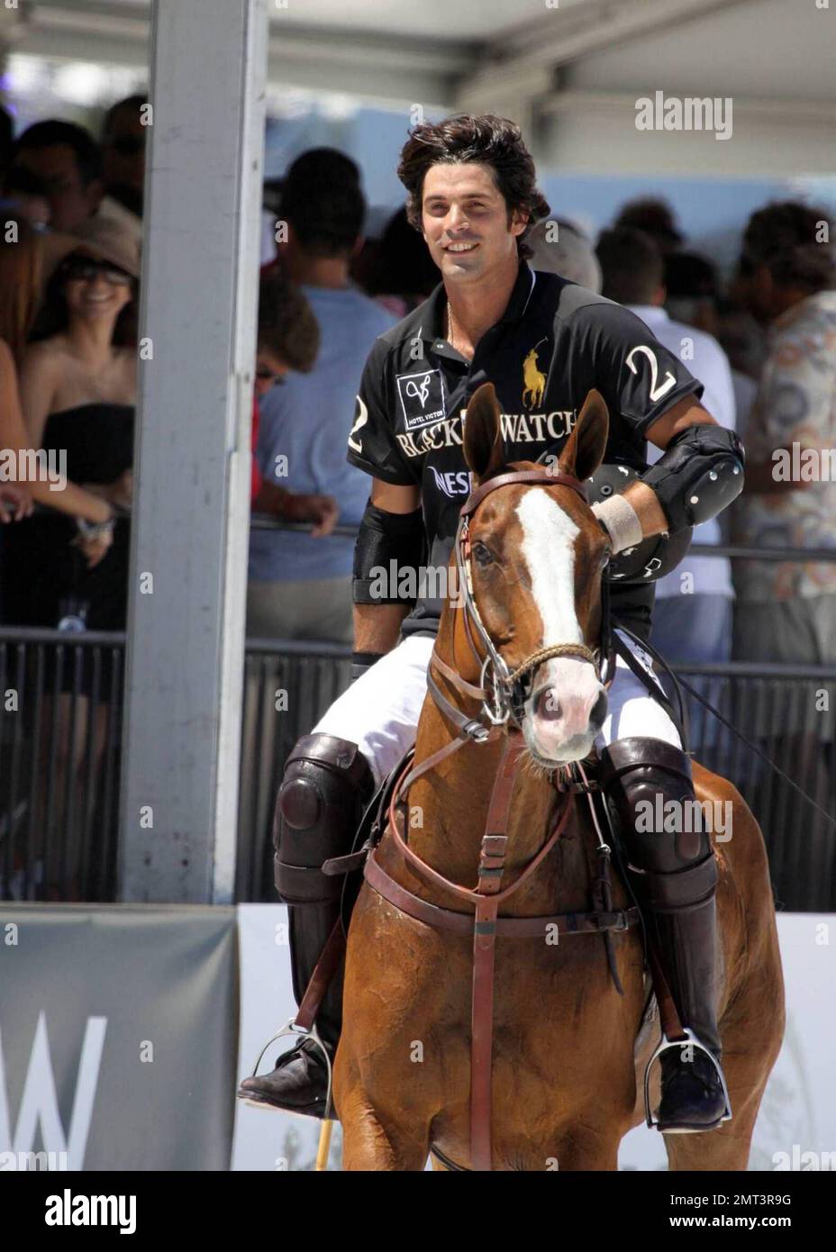 Nacho Figueras, Ralph Lauren model and member of the BlackWatch polo team,  is joined by his wife, Delfina Blaquier, while participating at the 2009  Miami Beach Polo World Cup in Miami Beach,