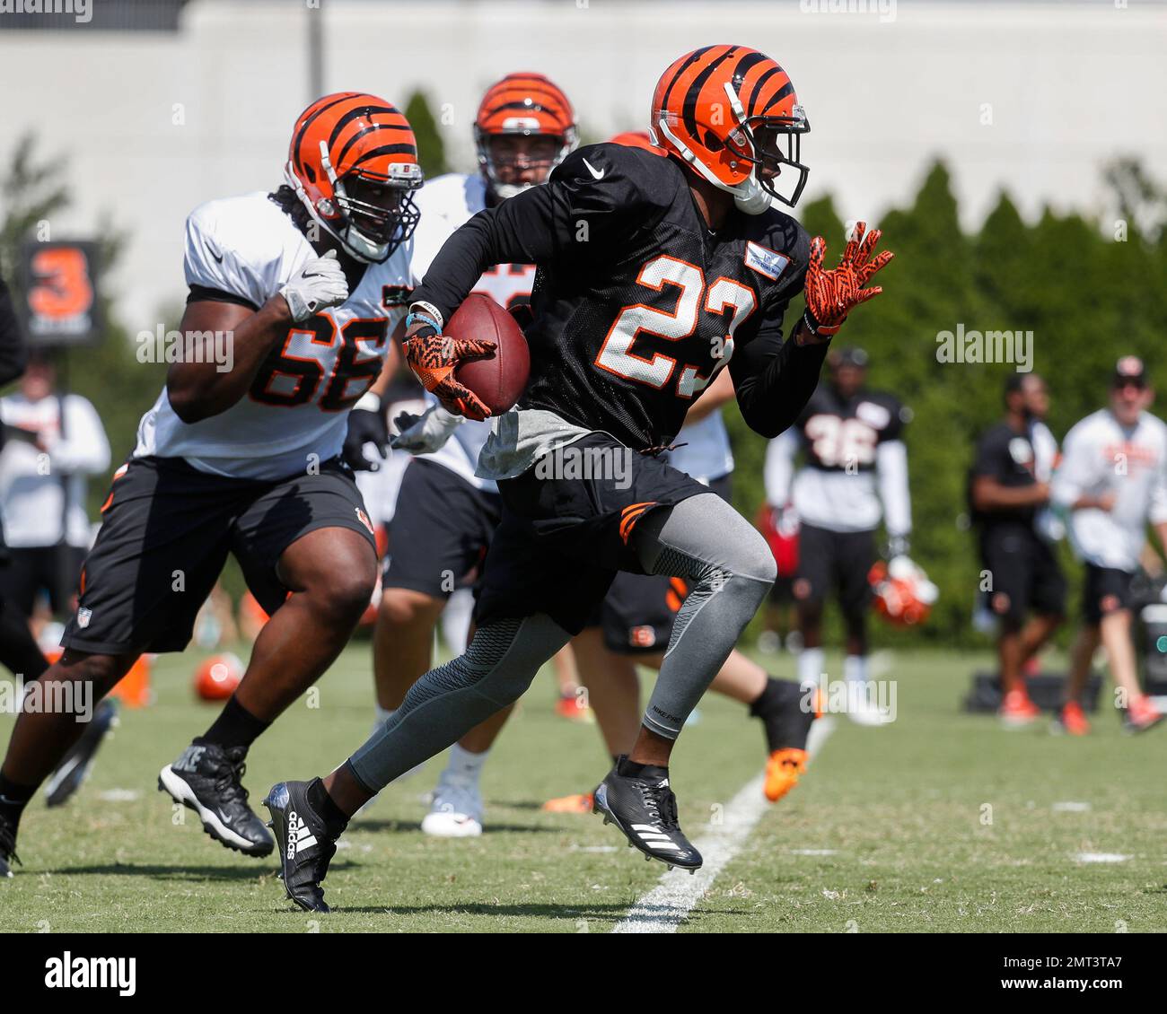 Cincinnati Bengals cornerback Bene Benwikere runs out an interception
