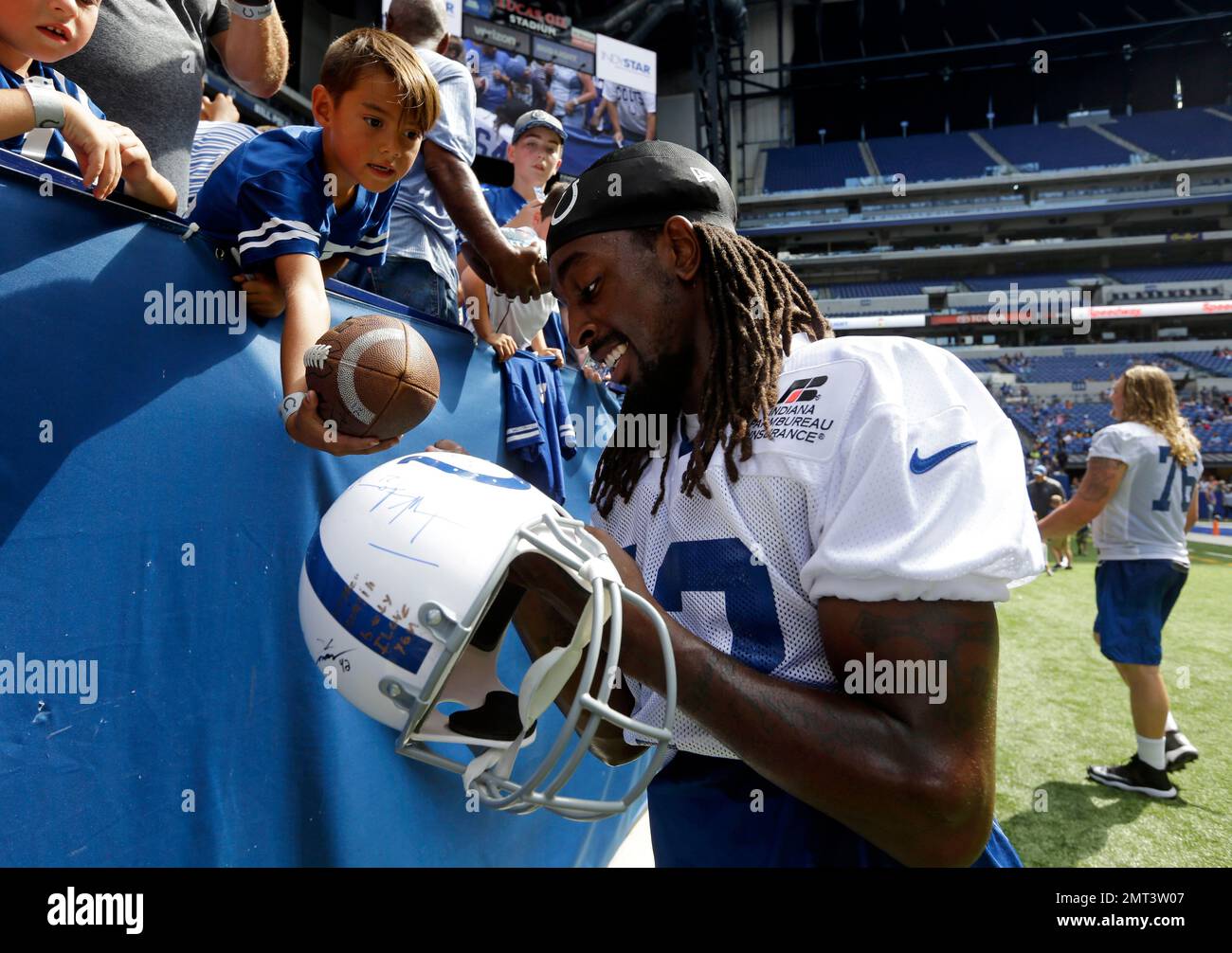 Indianapolis Colts wide receiver T.Y. Hilton (13) gives autographs to fans  following practice at the NFL team's football training camp in Indianapolis,  Sunday, July 30, 2017. (AP Photo/Michael Conroy Stock Photo - Alamy