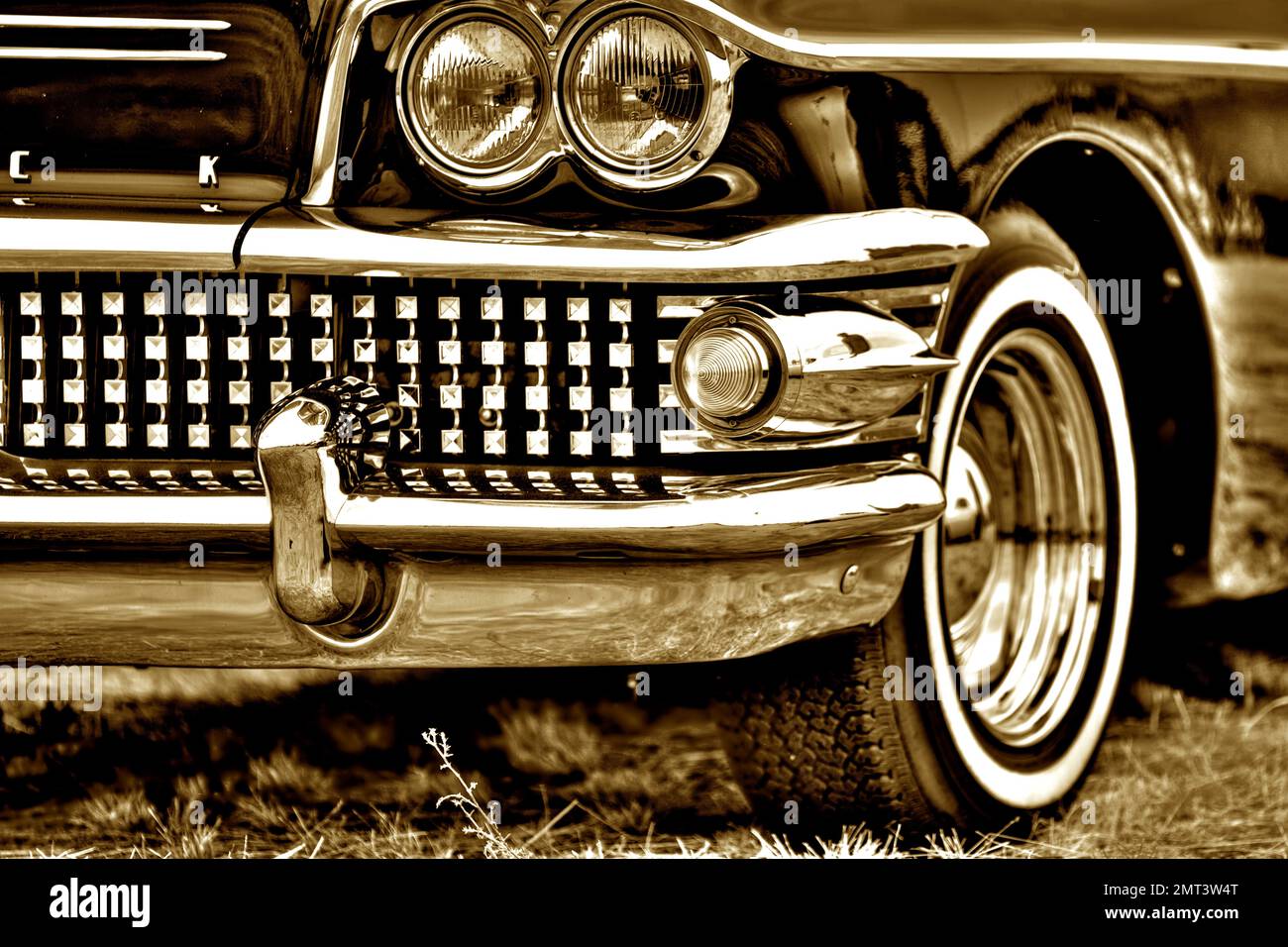 A greyscale shot of the Buick Century Riviera 1958 with Tail Fin Stock Photo