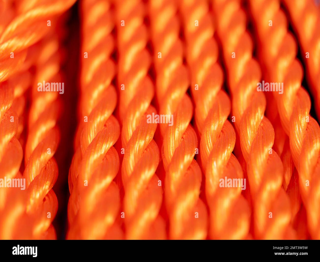 Orange rope close-up. Texture of braided rope. Orange background Stock ...