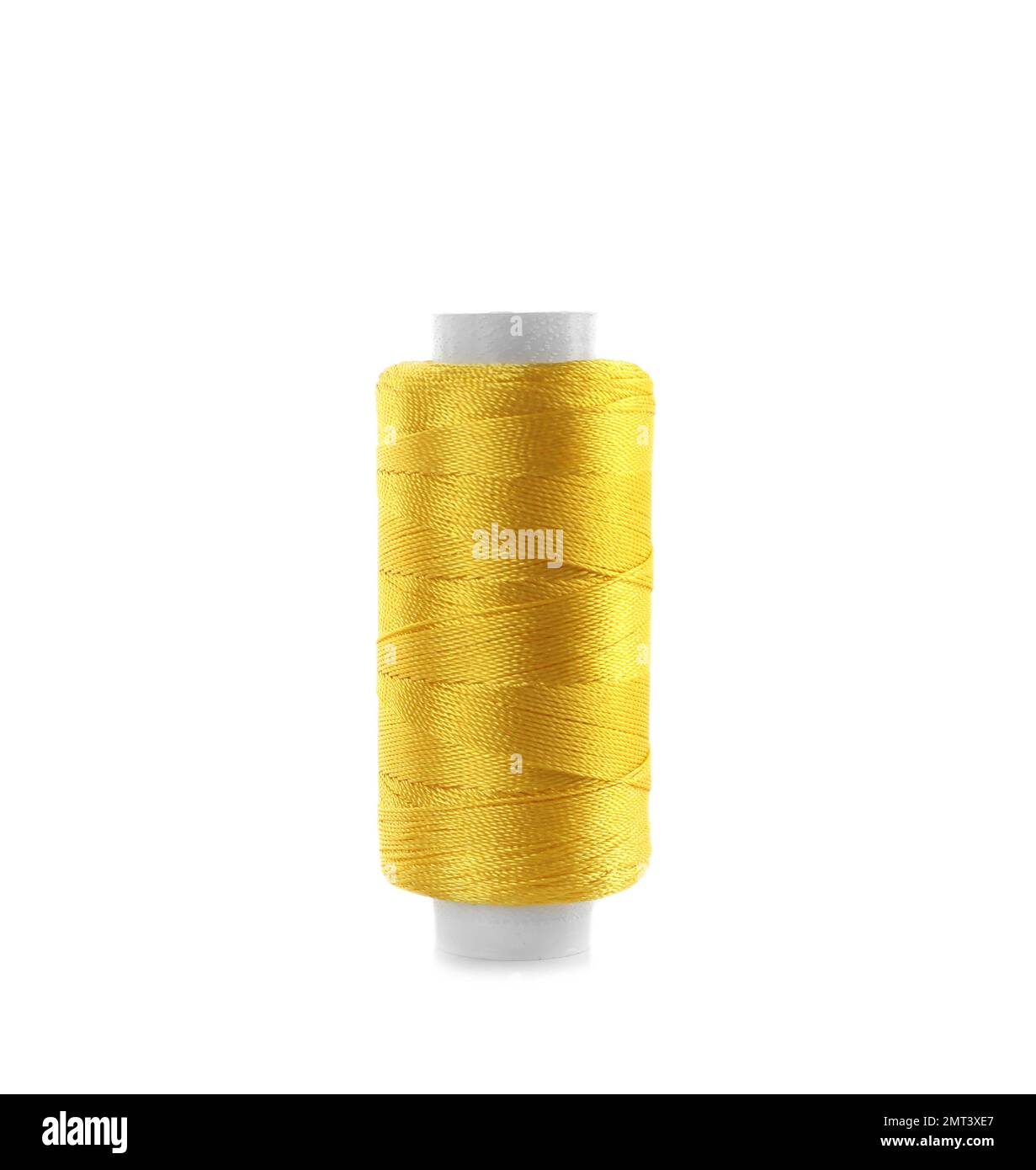 Spool of yellow sewing thread isolated on white Stock Photo - Alamy