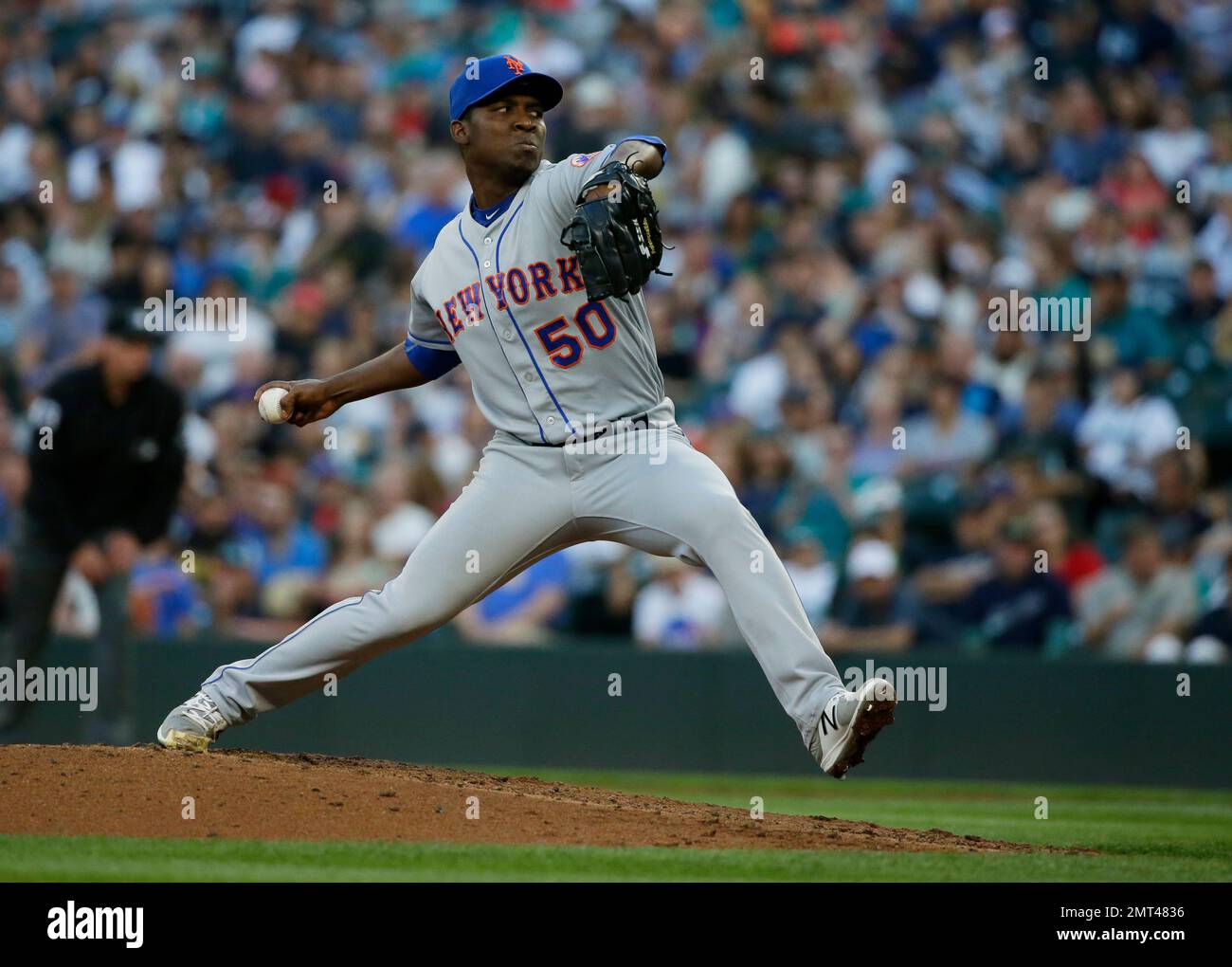 New York Mets starting pitcher Rafael Montero throws against the Seattle Mariners in the third