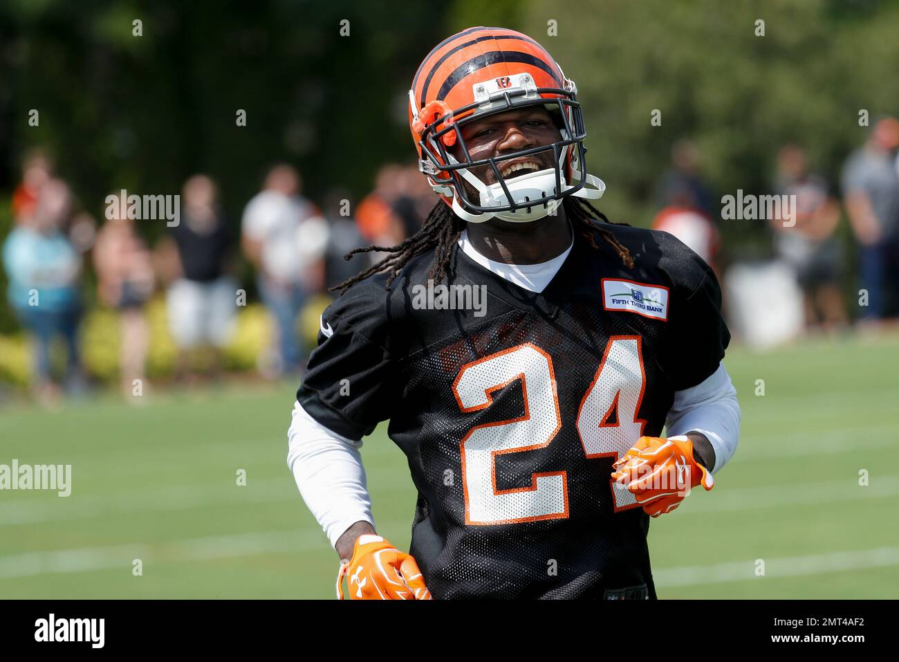 Cincinnati Bengals cornerback Adam Jones smiles as he runs the sideline  during NFL football training camp, Friday, July 28, 2017, in Cincinnati.  (AP Photo/John Minchillo Stock Photo - Alamy