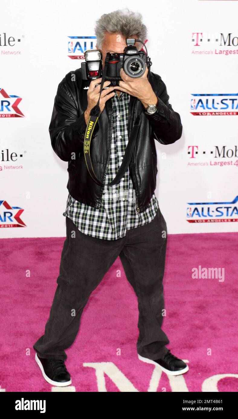 Dustin Hoffman has fun taking pictures on the pink carpet ahead of the 2011 NBA All-Star game held at the Staples Center. Los Angeles, CA. 02/20/11. Stock Photo