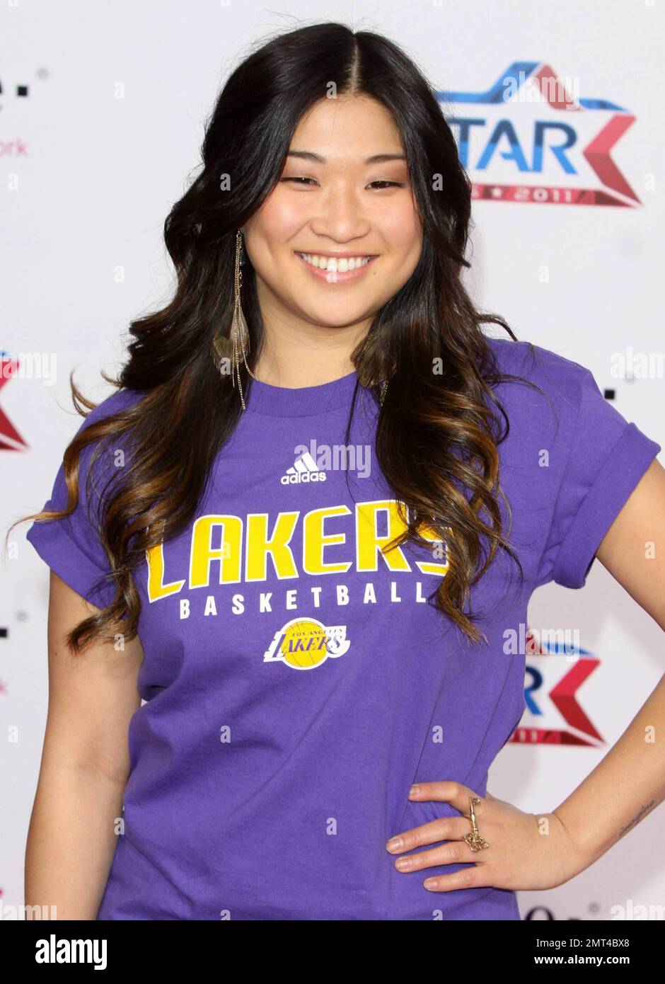 Actress Jenna Ushkowitz poses for photographers on the pink carpet