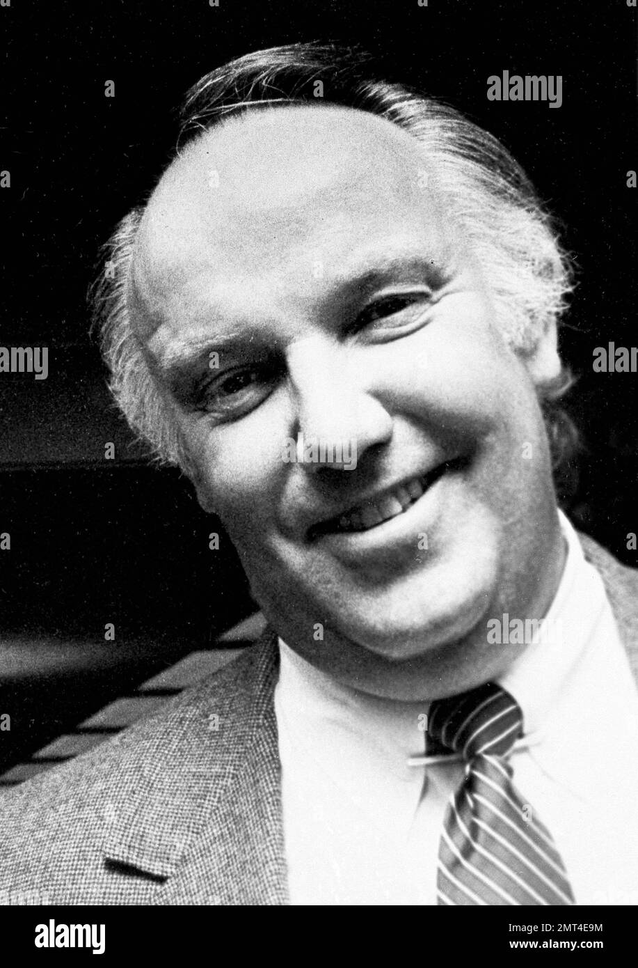 USC's football coach John Robinson smiles at a press luncheon on the ...