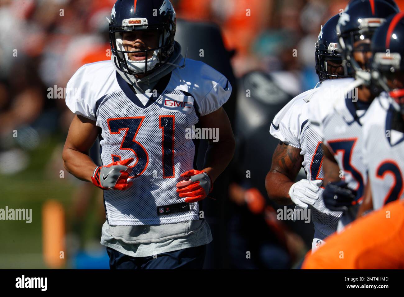 Which Denver Broncos safety will start opposite of Justin Simmons, Broncos  Camp Preview