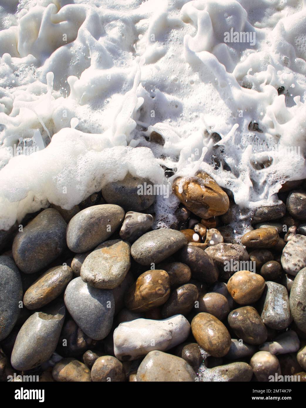 The splashing waves on the rocky shore Stock Photo - Alamy