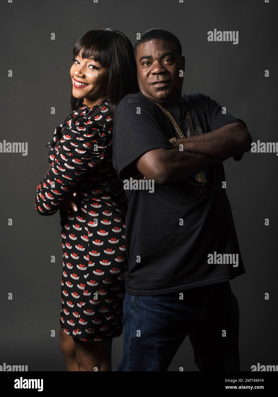 Tiffany Haddish, left, and Tracy pose for a portrait while