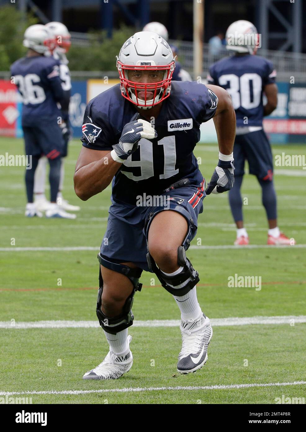 New England Patriots defensive end Deatrich Wise (91) performs field