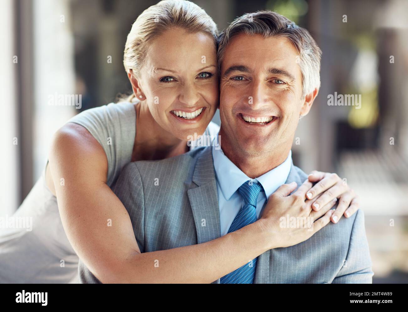 Beautiful couple hugging other sitting hi-res stock photography and ...