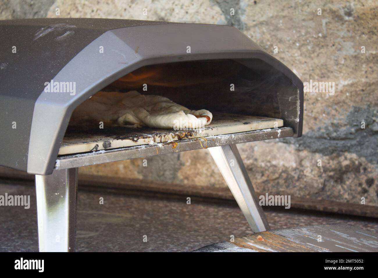 Small gas oven to make homemade pizzas. No people Stock Photo Alamy