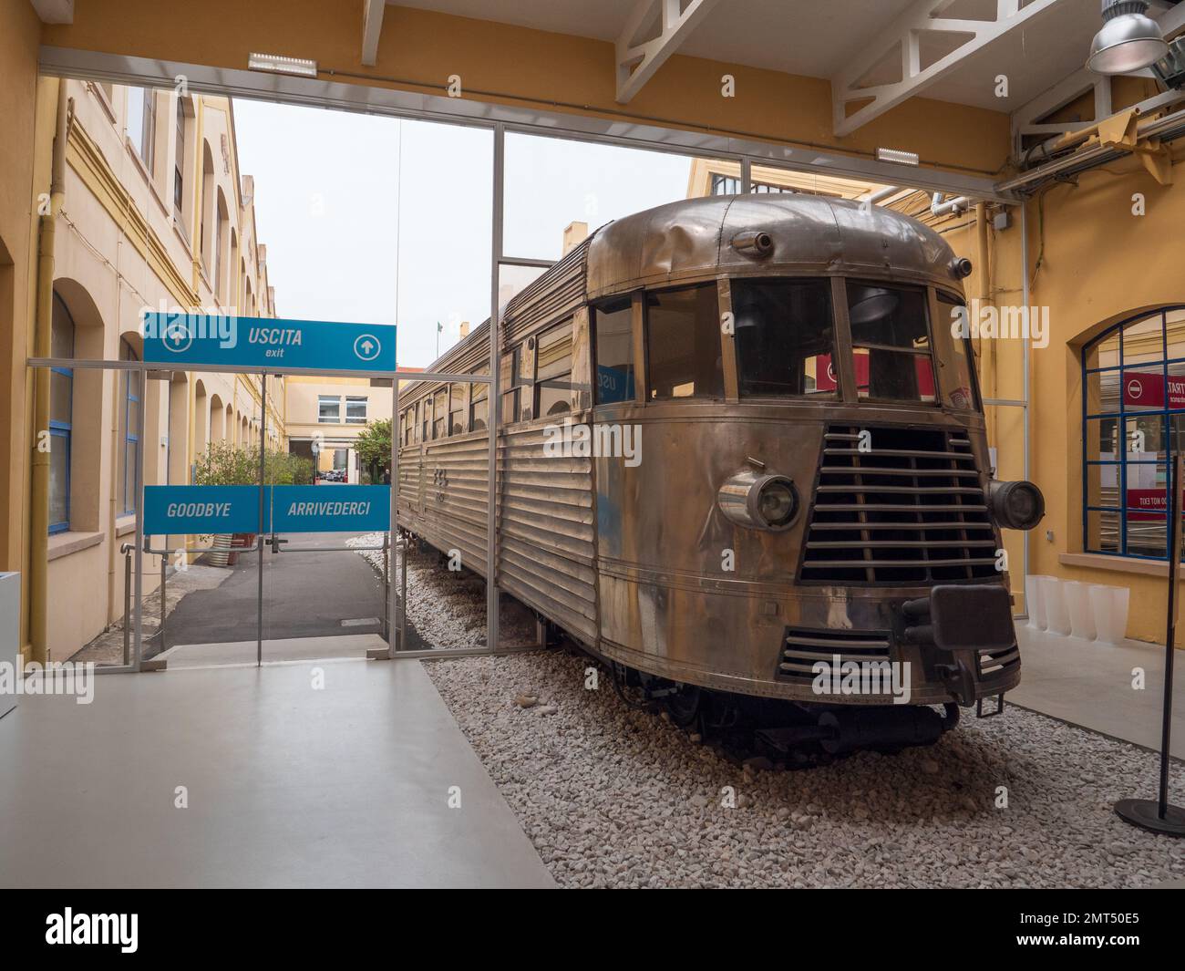 An Aluminium train in the entrance of the museum to Vespa scooters at the Piaggio museum, Pontedera, Italy Stock Photo