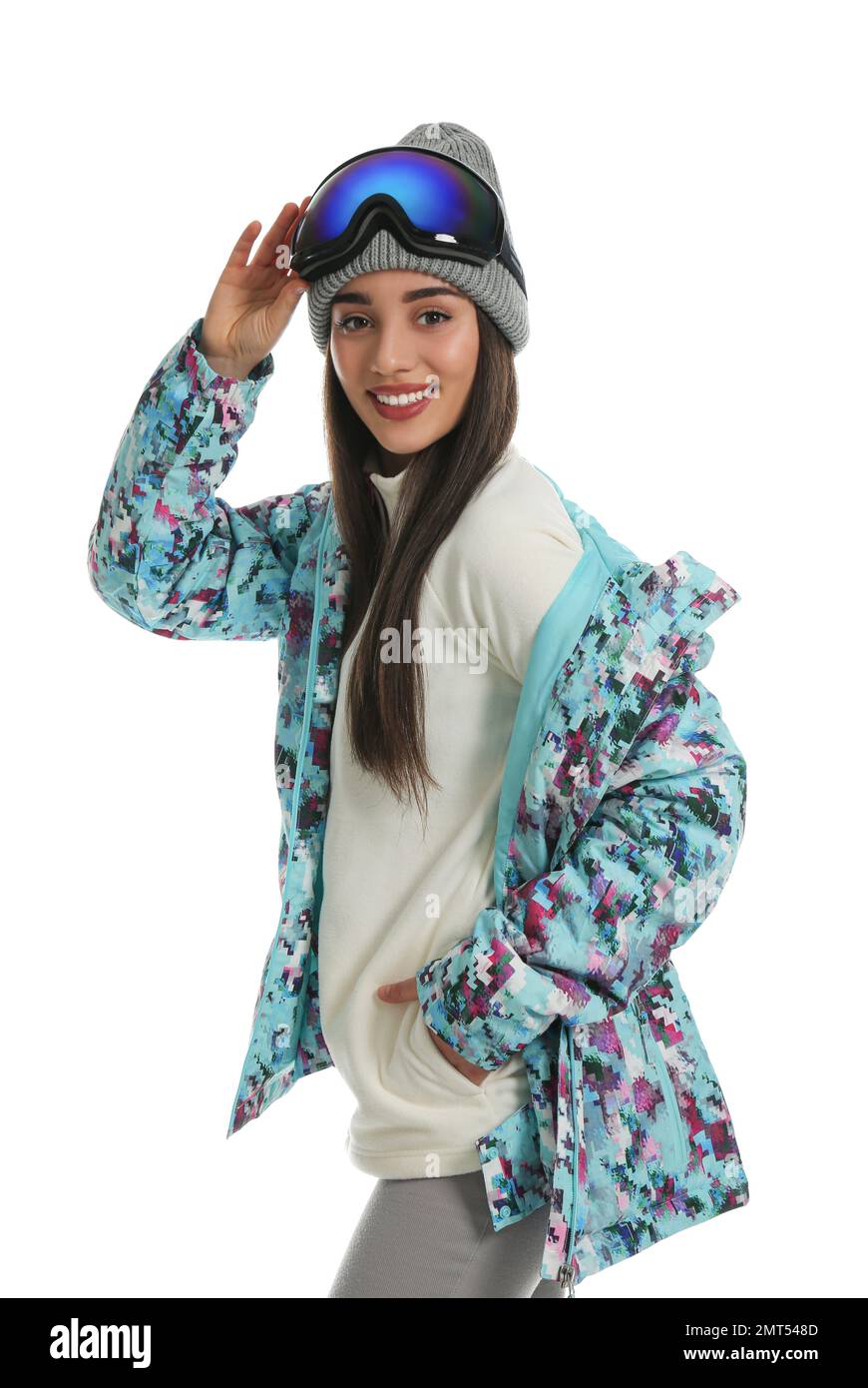 Woman wearing stylish winter sport clothes on white background Stock