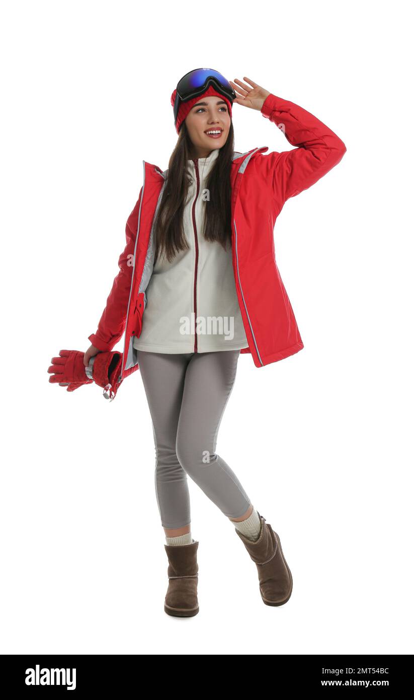 Woman wearing stylish winter sport clothes on white background Stock