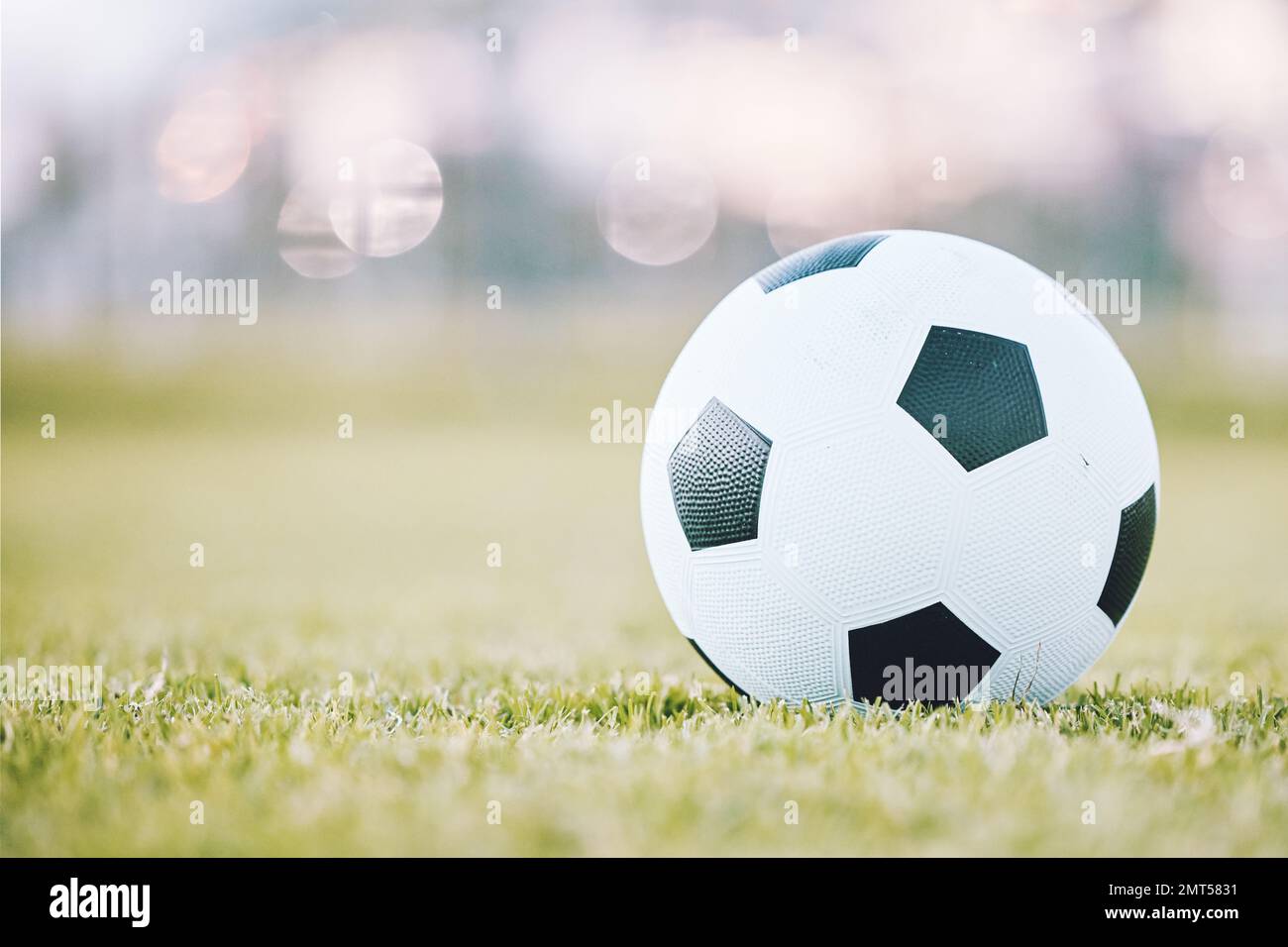 Soccer, ball and field ready for game time or match start in sports,  athletics or tournament in the outdoors. Round sphere object with pentagon  shape Stock Photo - Alamy