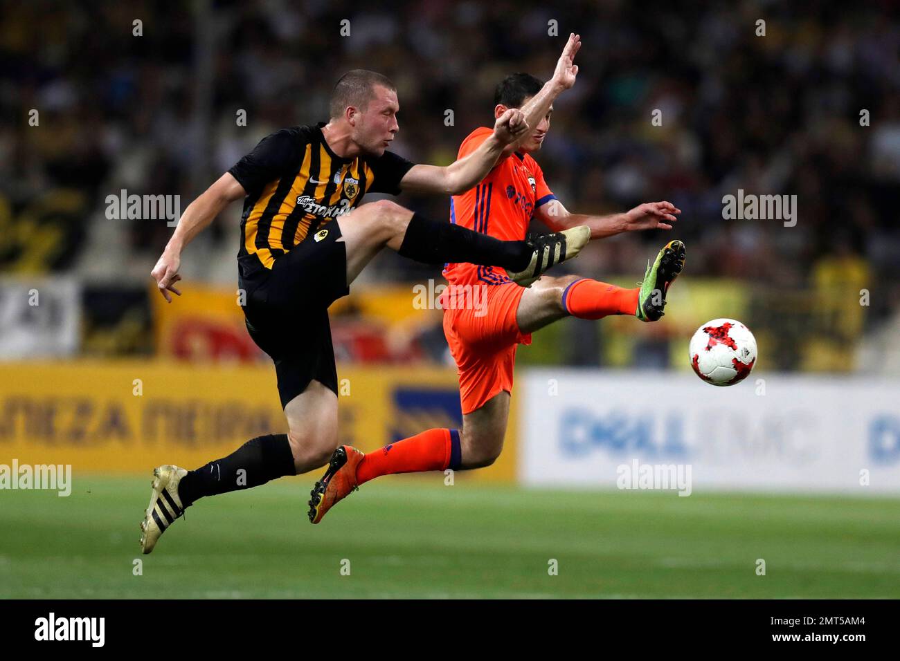 AEK Athens' Jakob Johansson, left, and CSKA Moscow's Alan Dzagoev challenge  for the ball during a soccer match for the third qualifying round of  Champions League at Olympic stadium of Athens, Tuesday,