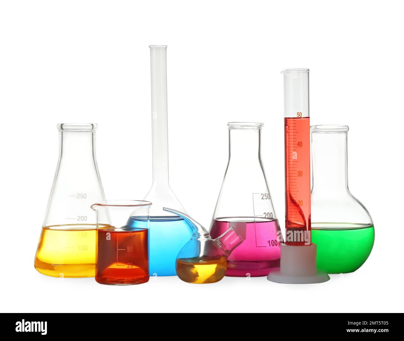 Different laboratory glassware with colorful liquids isolated on white
