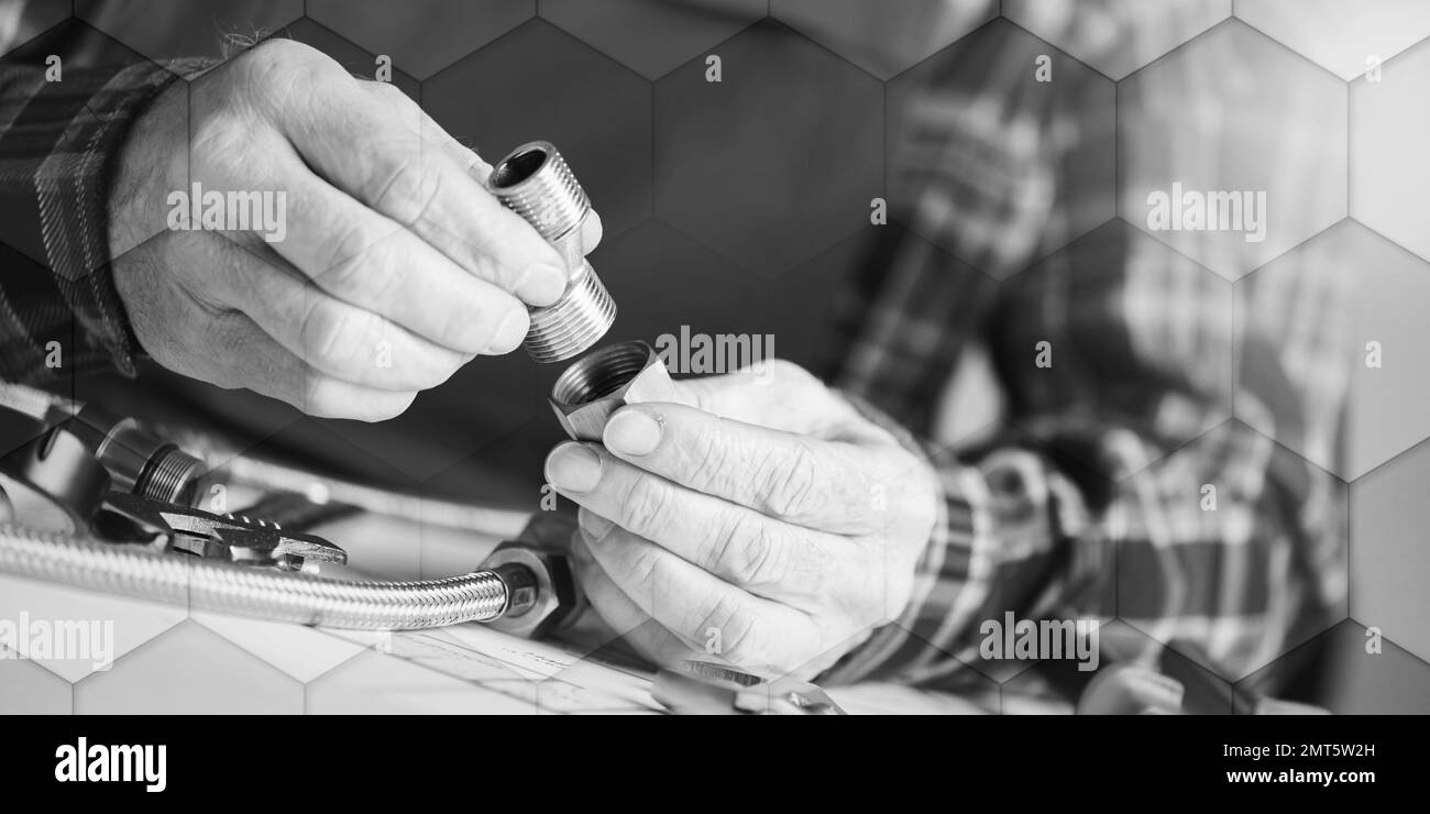 Plumber hands using plumbing fittings, light effect, geometric pattern Stock Photo