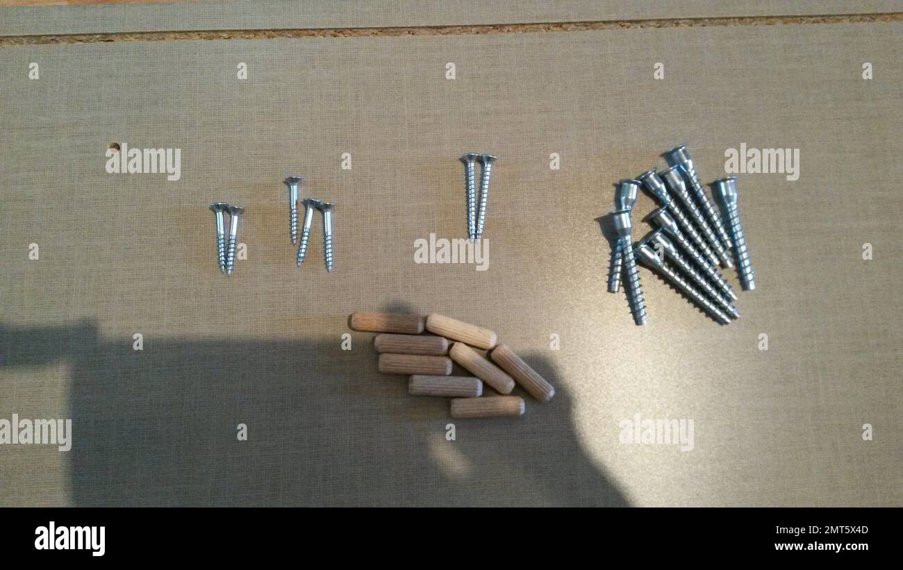Screws when assembling a shelf Stock Photo Alamy