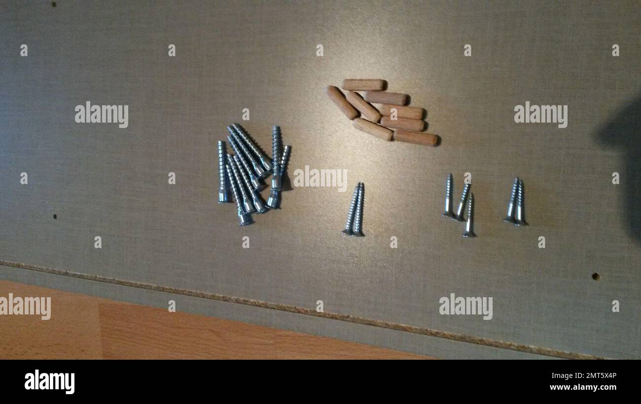 Screws when assembling a shelf Stock Photo Alamy