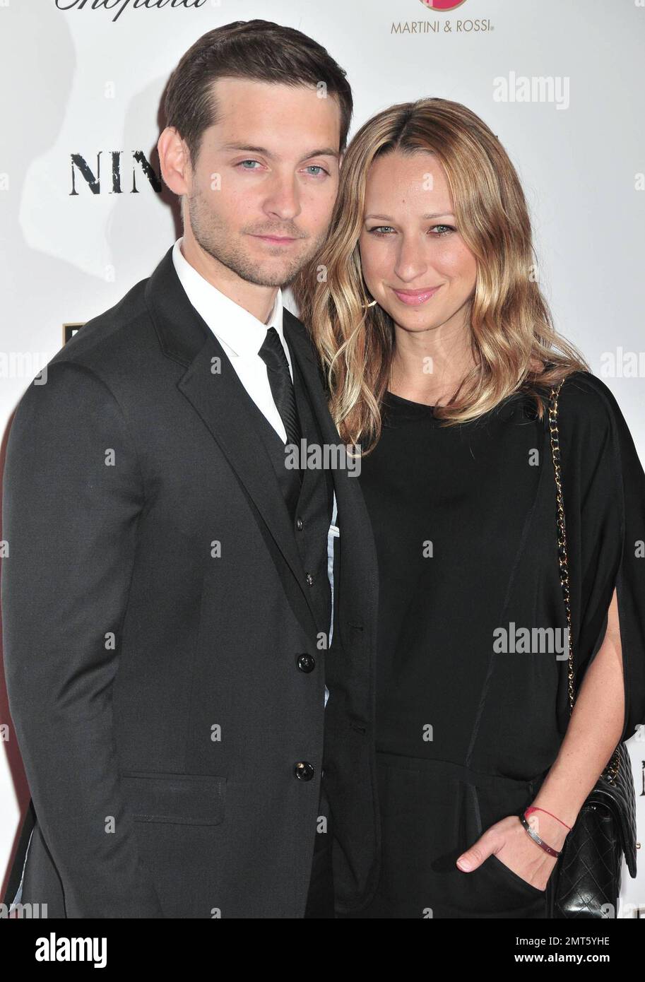 Tobey Maguire and Jennifer Meyer at the premiere of Nine held at the ...