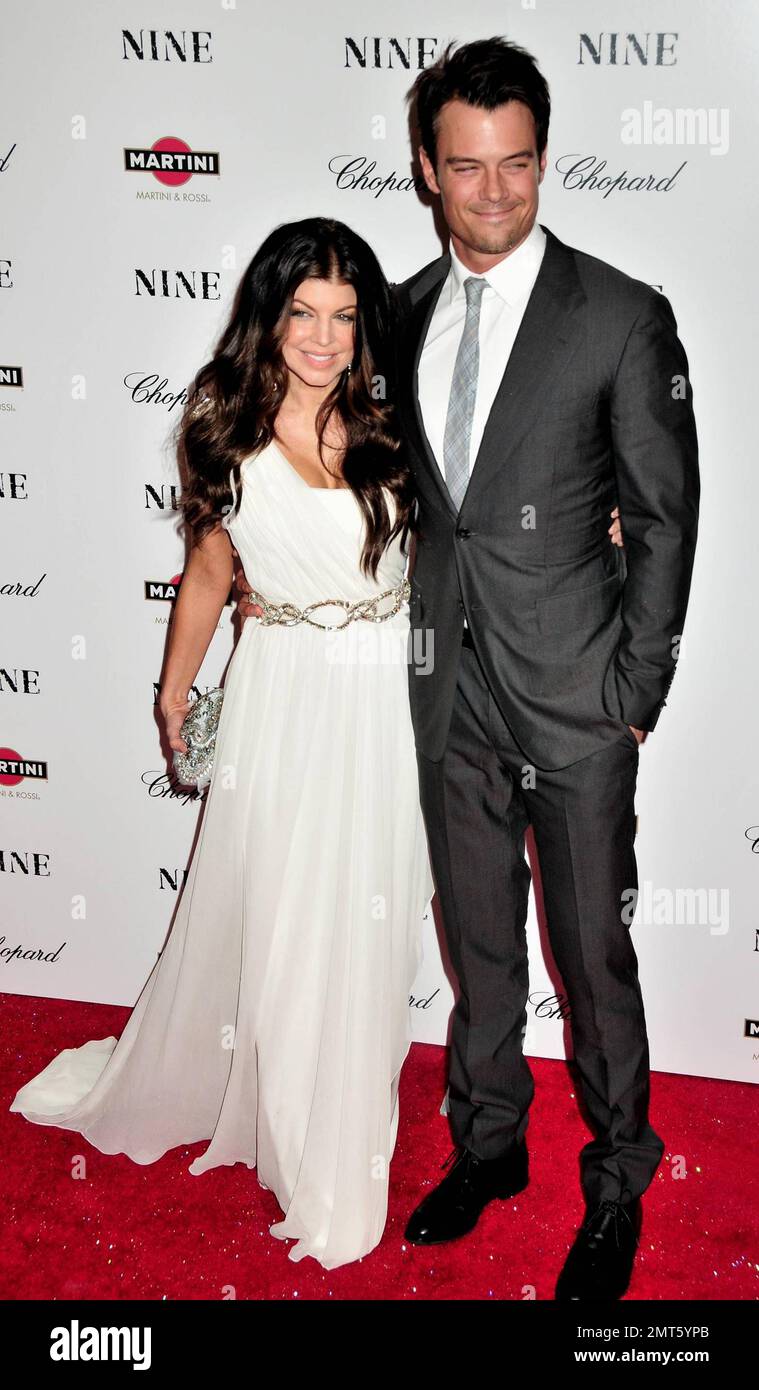 Fergie of the Black Eyed Peas real name Stacy Ferguson and husband Josh  Duhamel at the premiere of Nine held at the Ziegfeld Theatre in Manhattan,  New York. NY. 12/15/09 Stock Photo -