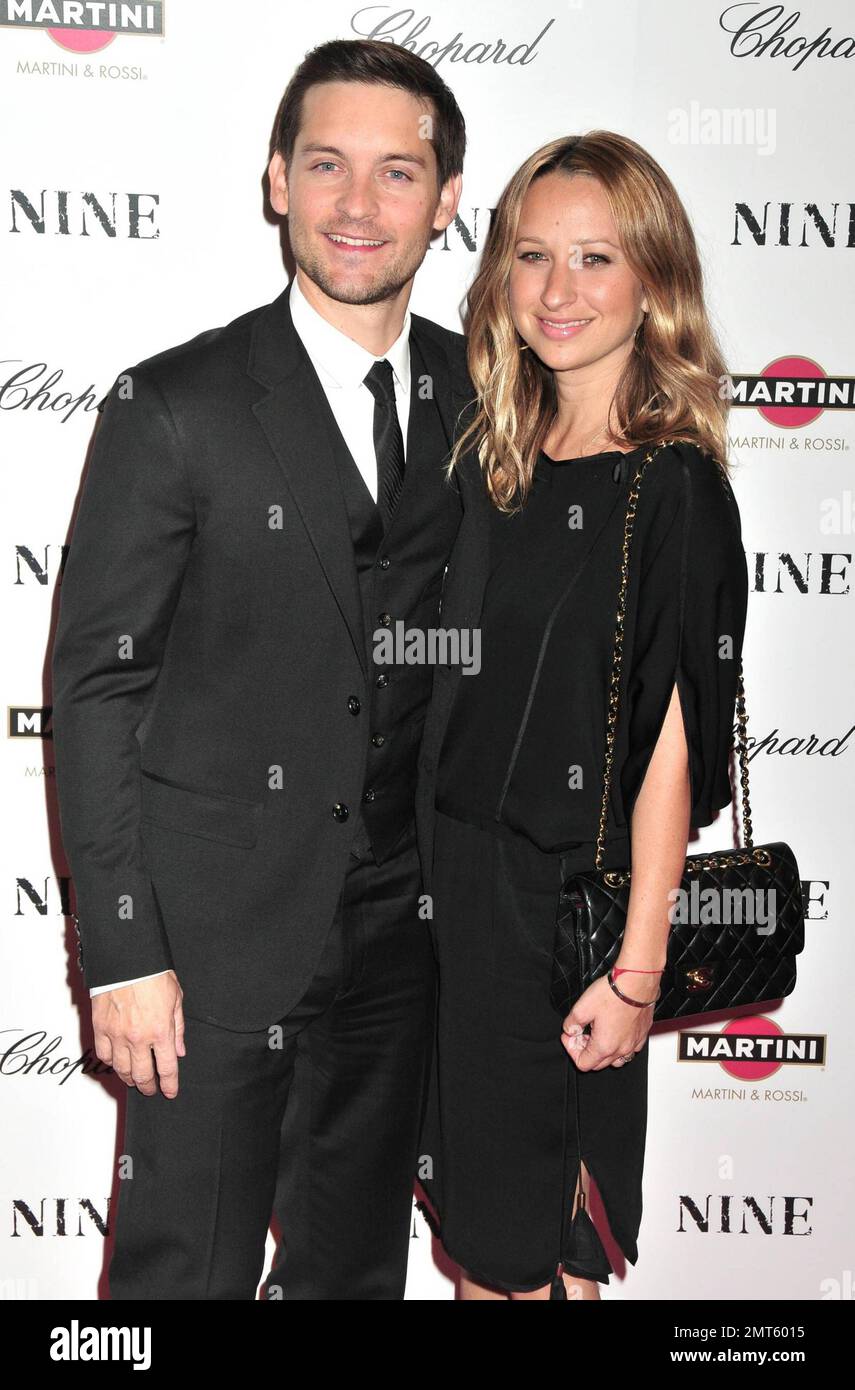 Tobey Maguire and Jennifer Meyer at the premiere of Nine held at the ...