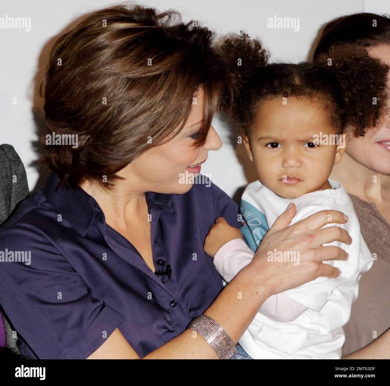 Natasha Kaplinsky and Iris attend the launch of Save The Children's 2011 'No Child Born To Die' campaign held at The Lincoln Centre.  Celebrity charity ambassadors attended the campaign launch which is 'calling for an end to the deaths of millions of children who die from easily preventable causes every year.'  London, UK. 01/24/11. Stock Photo