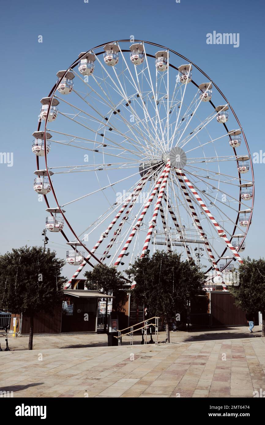 ferris wheel in the main square in the entrance if the old city in ...