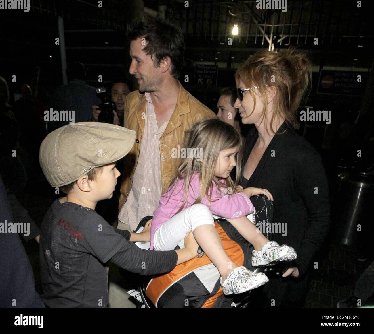 "ER" star Noah Wylie and family arrive stateside at Los Angeles