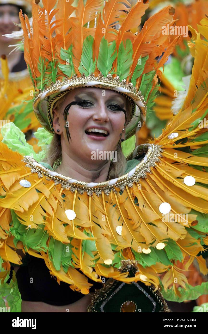 Performers march in a parade at the 2008 Notting Hill Carnival. Taking