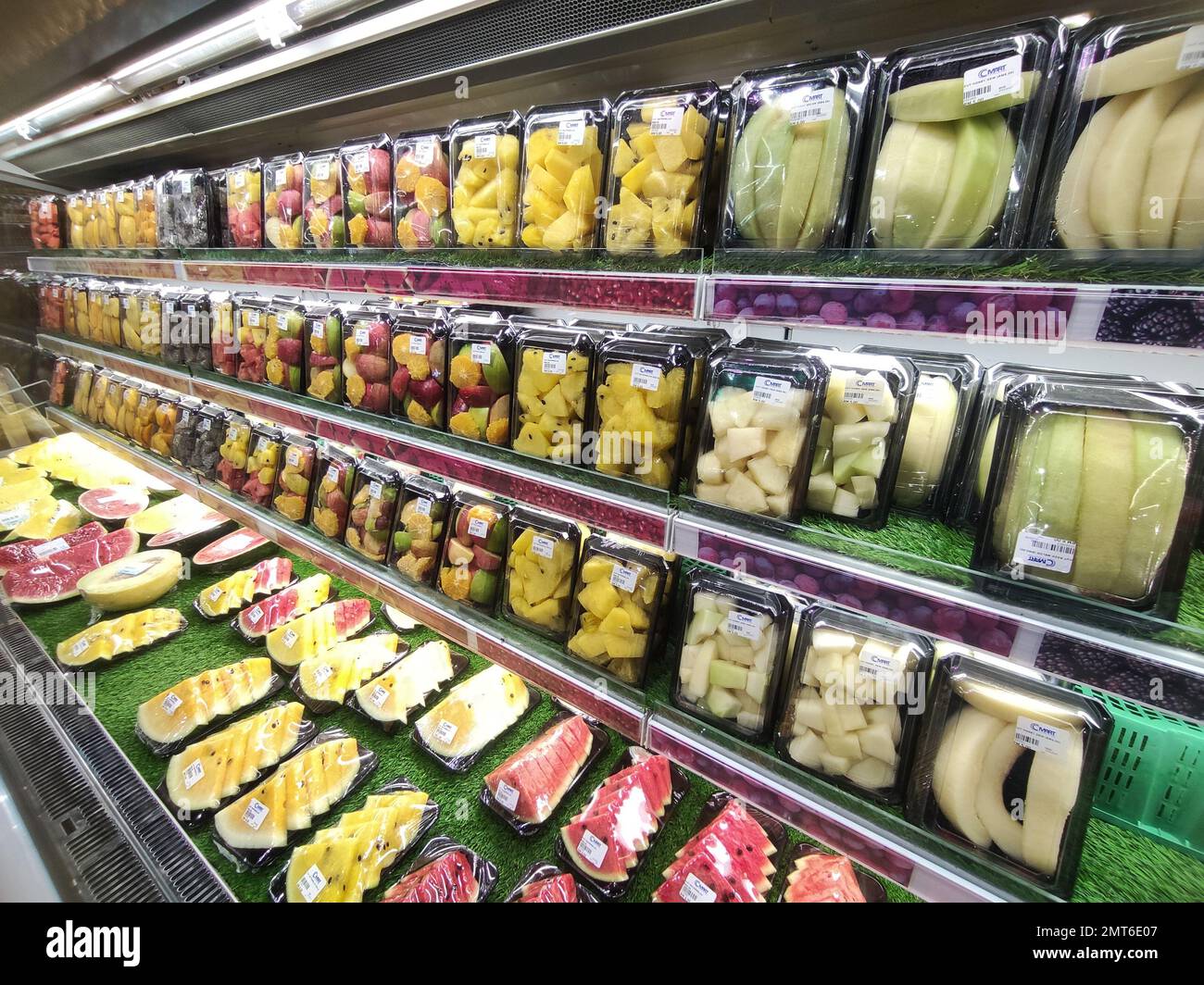 Various colorful fresh fruits on shelf in supermarket for background Stock Photo Alamy