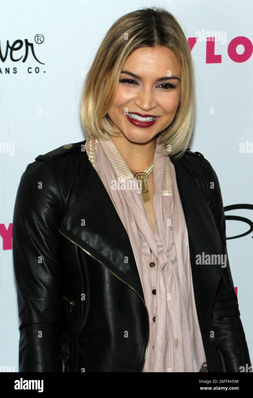 Actress Samaire Armstrong poses for photographers on the red carpet at NYLON magazineÕs 12th anniversary party held at Tru and hosted by the ravishing and beautiful stars of the new epic action fantasy movie "Sucker Punch". Los Angeles, CA. 03/24/11. Stock Photo